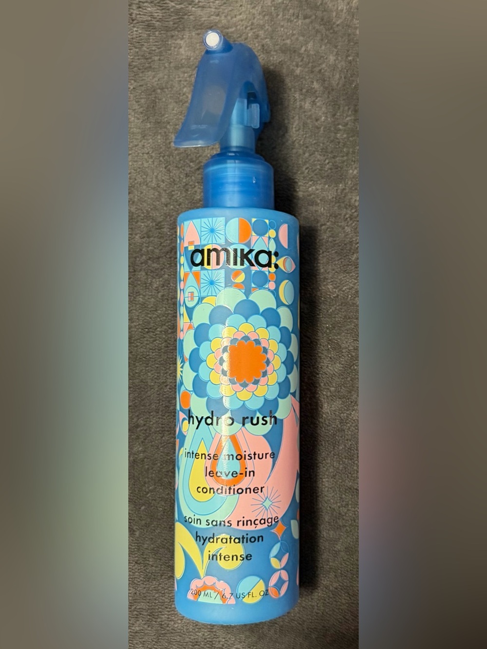 amika Hydro Rush Intense Moisture Leave-In Spray – Full Size 6.7 oz; new/unused